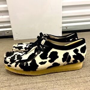 Brand new never been worn, Clark’s Wallabees. Cow print!